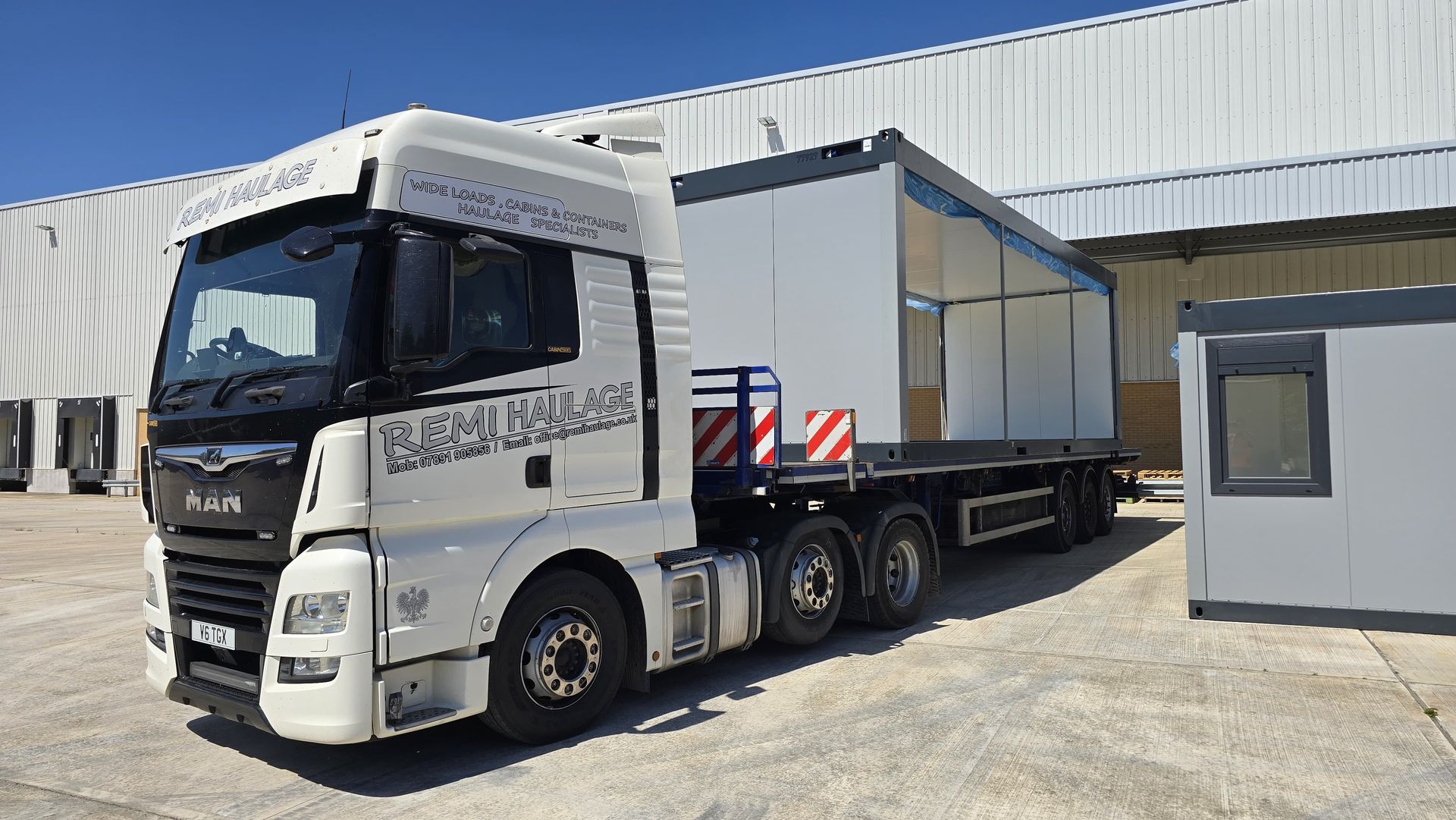 Large portable building in transport